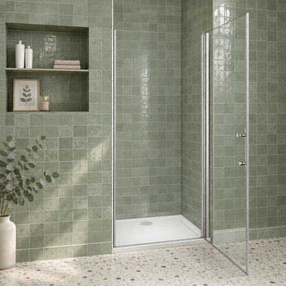 Porte de douche pivotante pour niche – en situation dans une salle de bain