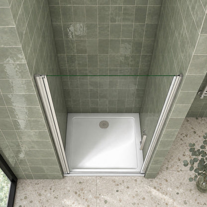 Porte de douche pivotante pour niche – en situation dans une salle de bain