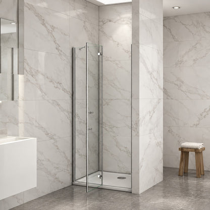 Porte de douche pivotante-pliante avec paroi fixe pour niche – en situation dans une salle de bain