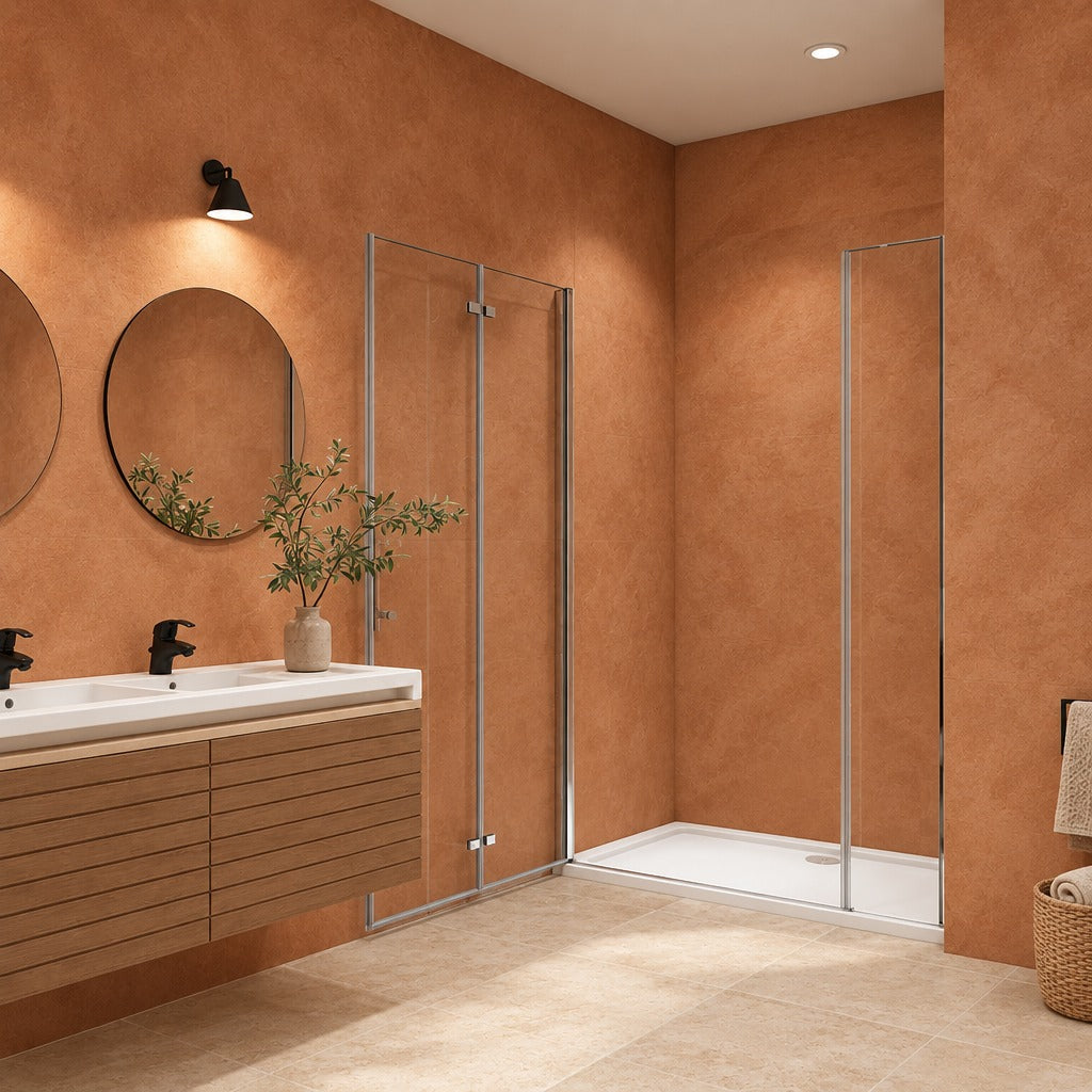 Porte de douche pivotante-pliante avec élément fixe pour niche – en situation dans une salle de bain