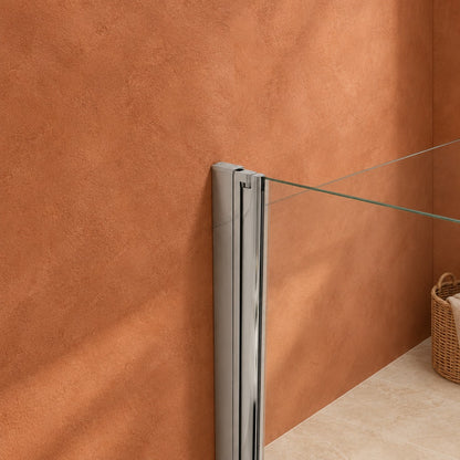 Porte de douche pivotante-pliante avec élément fixe pour niche – en situation dans une salle de bain