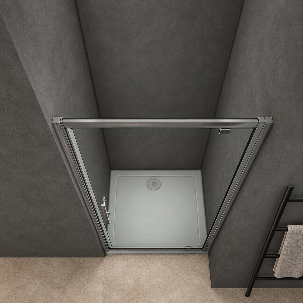 Porte de douche pivotante avec paroi fixe pour niche – en situation dans une salle de bain
