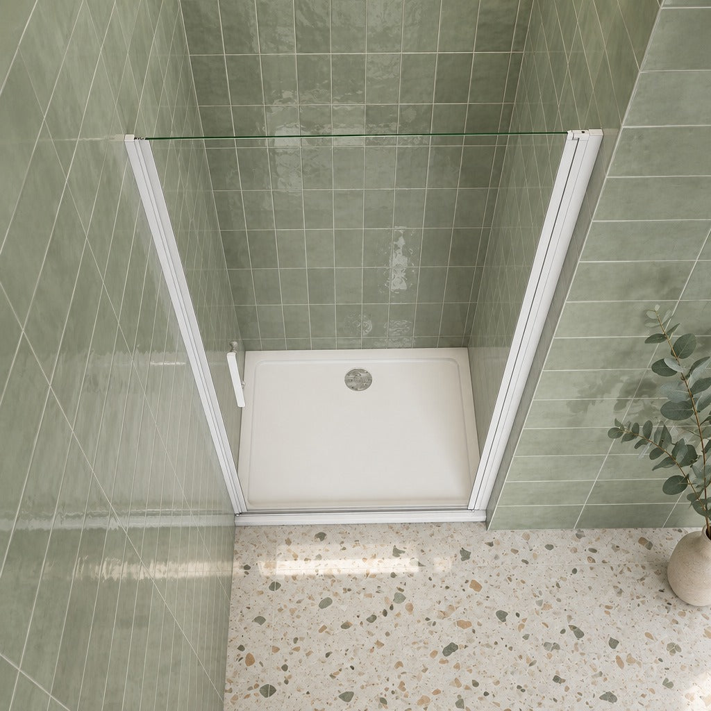 Porte de douche pivotante pour niche – en situation dans une salle de bain