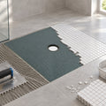 Receveur de douche à carreler recoupable pour douche à l'italienne – en situation sur chantier
